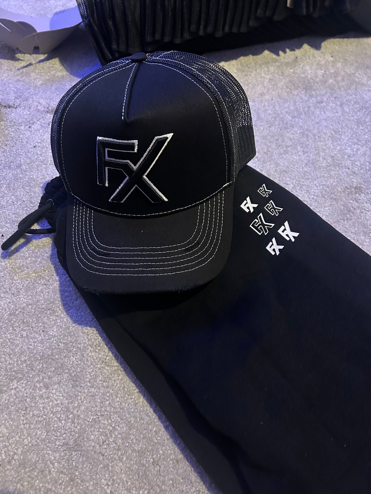 Flux Black x White Thread Trucker Hat