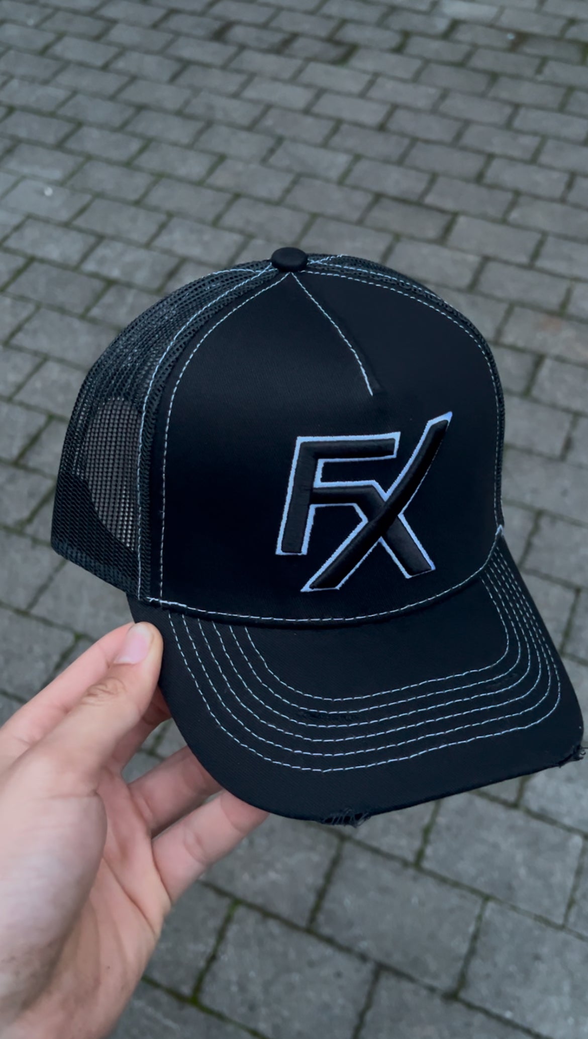 Flux Black x White Thread Trucker Hat