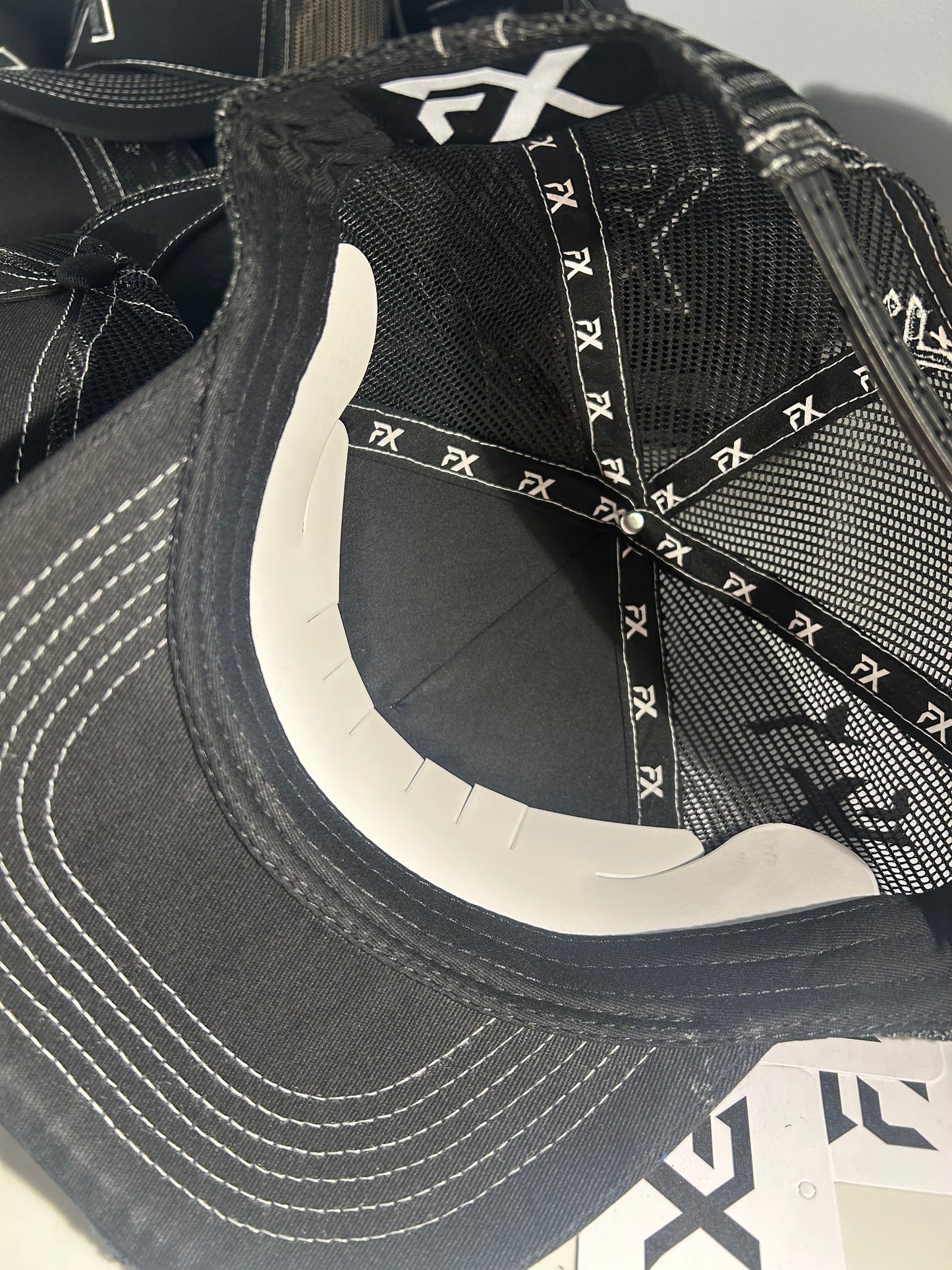Flux Black x White Thread Trucker Hat